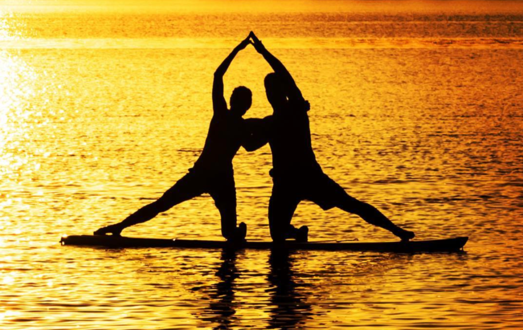 Sup Yoga with Debby Siegel at Creve Coeur Lake on Tuesdays at sunset.
