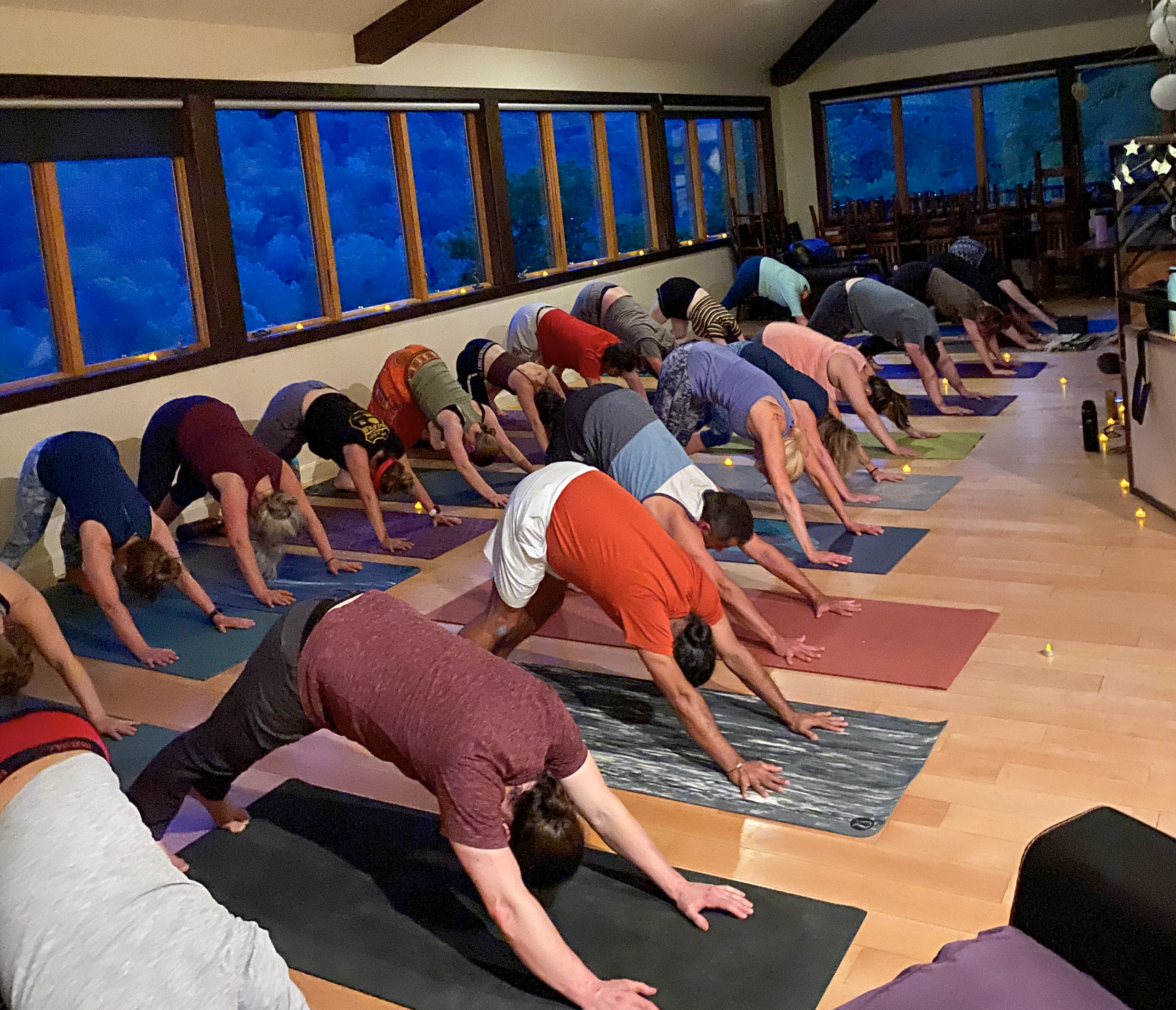 Climbers doing yoga at yoga retreat