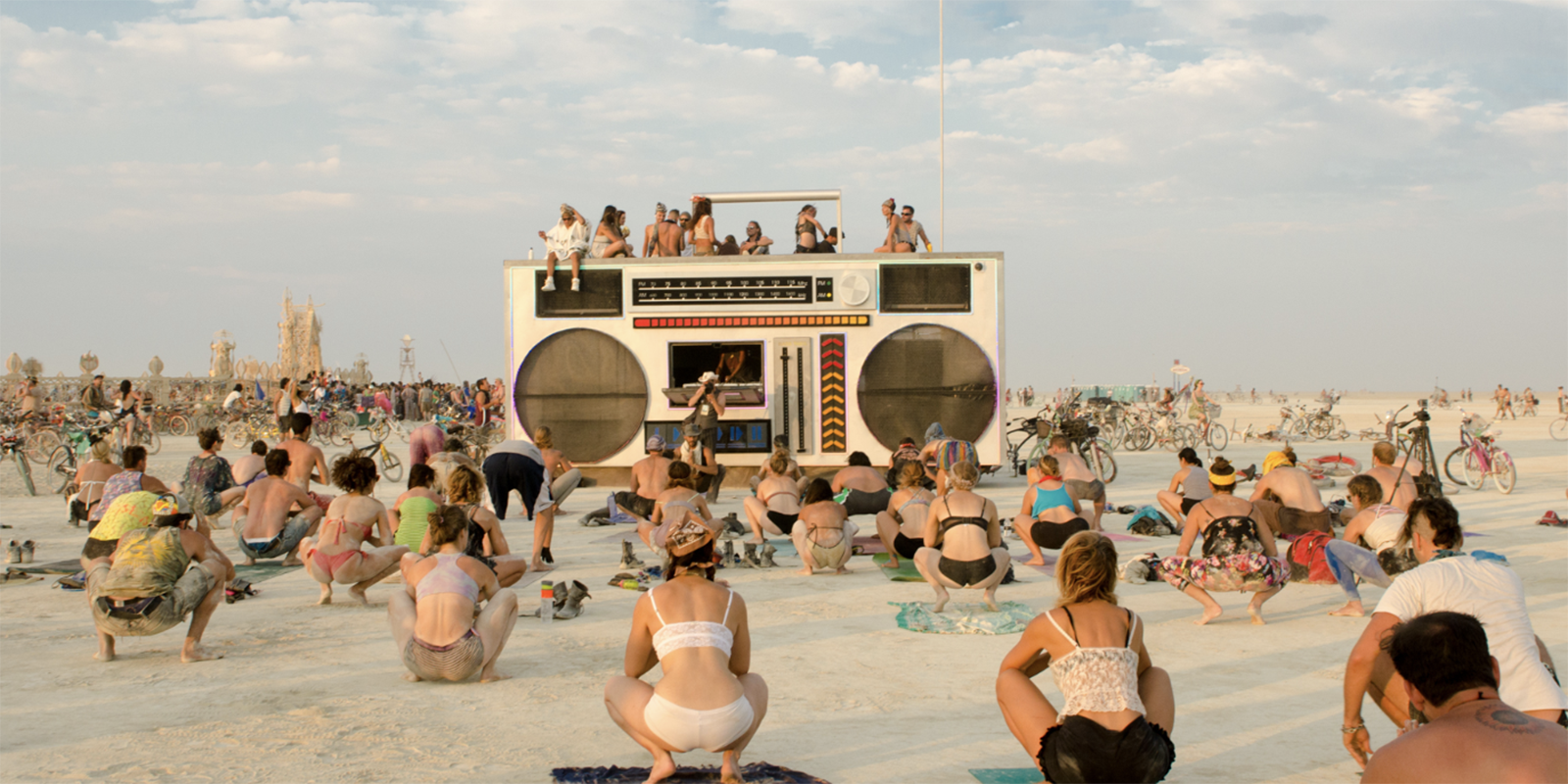 People practicing yoga on the Playa in Black Rock City at Burning Man